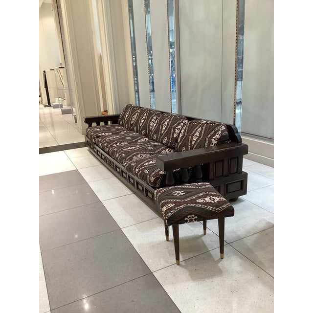Rare, Beautiful Wooden Sofa in amazing condition. It's newly reupholstered in a very nice fabric textile featuring a Kilim...