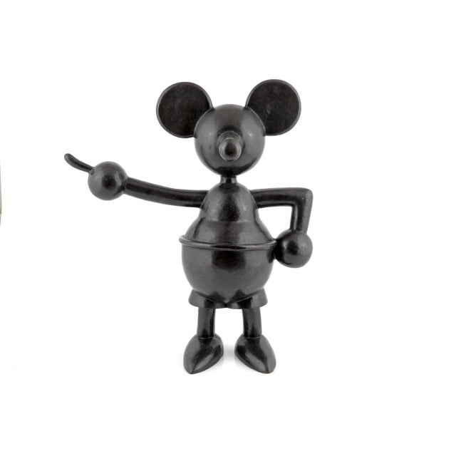 Patinated bronze sculpture by the Spanish artist Fernando Bellver, from his "Animated I" series. The work depicts...