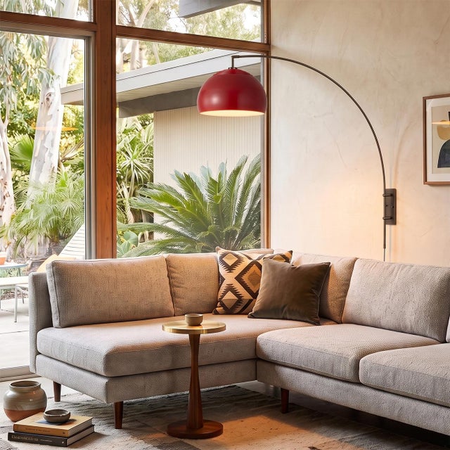 The Half Dome Wall Mounted Arc Lamp is a Modern wall-mounted arc lamp with a striking Mustard steel shade, designed by...