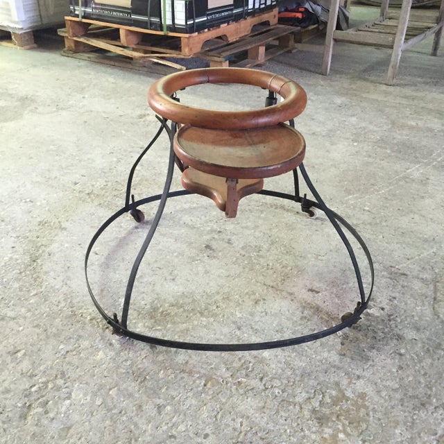 Vintage children's roll-around tender. Features wooden wheels, iron, leather, and springs. So gosh darn cute!!