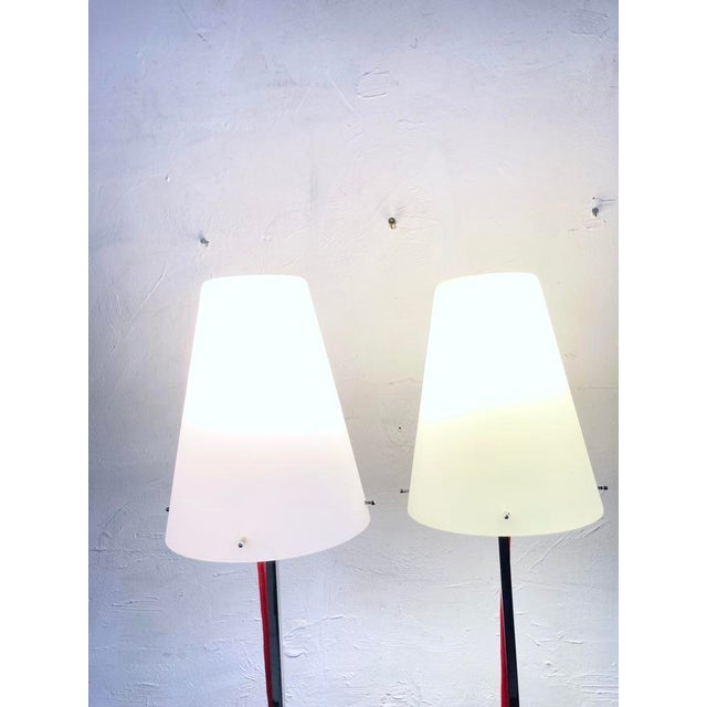 Two Italian floor lamps, E27 sockets, from the 1990s, designed in 1997 by Hannes Wettstein for Nemo, model Thuban Terra....