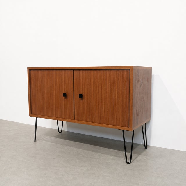 Vintage mdk lowboard manufactured in belgium in the 1960s. a compact and versatile piece suitable for use as a tv cabinet,...