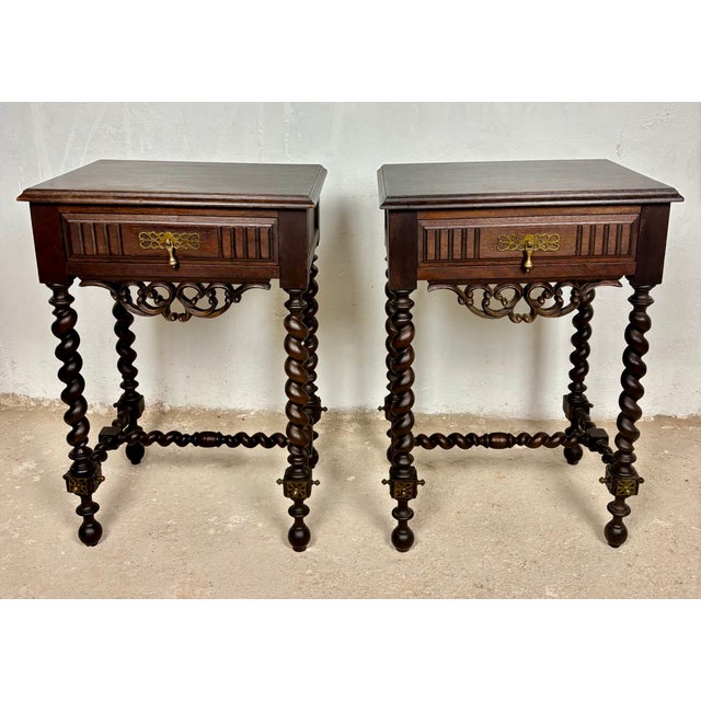 Elegant pair of Spanish nightstands featuring beautifully turned barley twist legs and stretchers, decorative wrought...