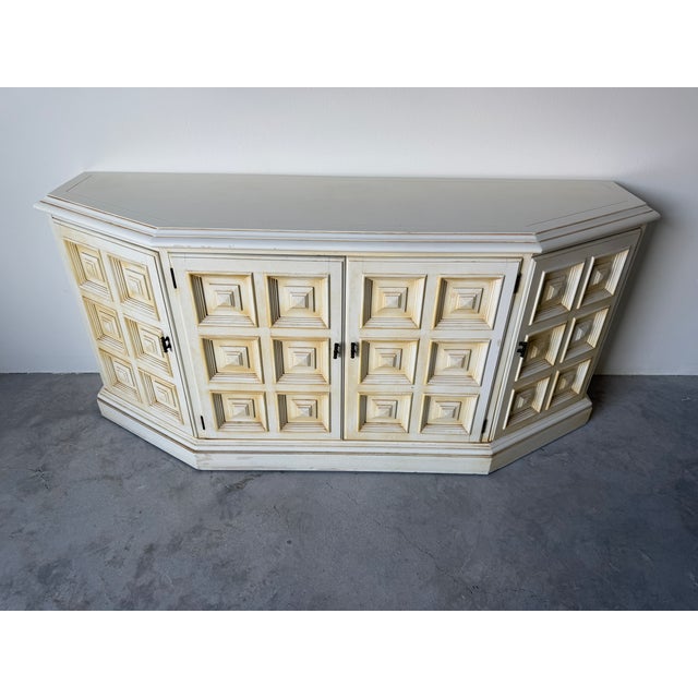 Striking vintage Drexel Esperanto buffet featuring a bold Mediterranean-inspired silhouette with sculptural geometric...