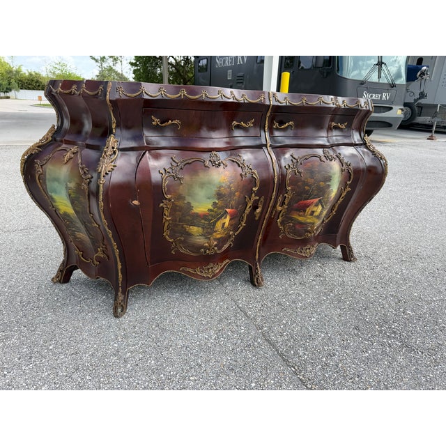 Stunning antique Hand-Painted French Bombe Buffet Louis XV, a type of decorative chest cabinet known for its outward-...