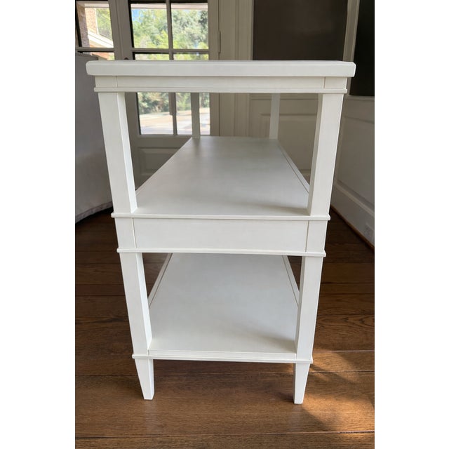 A refined statement piece with distinguished pedigree, this elegant console Attributed to Fairfield Chair Company was...