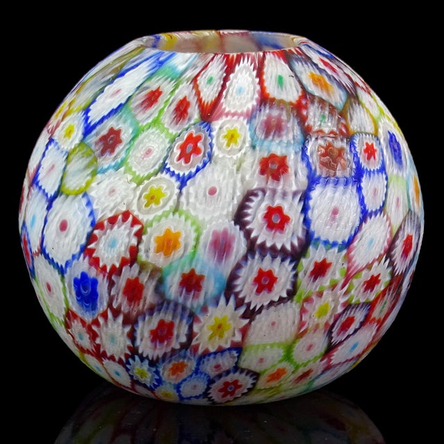 Beautiful vintage Murano hand blown multi-color Millefiori flower mosaic Italian art glass bud vase. The piece is...