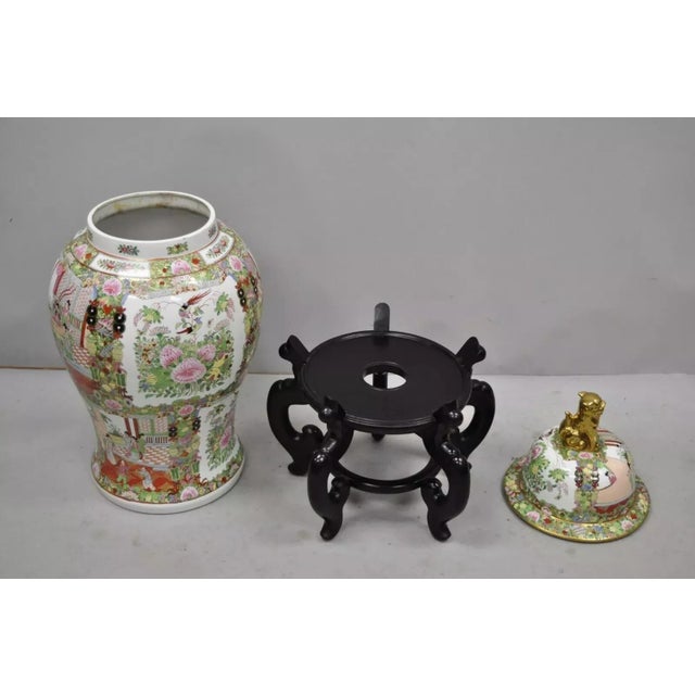 Vintage 36" Chinese Famille Rose Porcelain Urn Lidded Temple Jar Vase on Base. Item features a lidded temple jar, wooden...