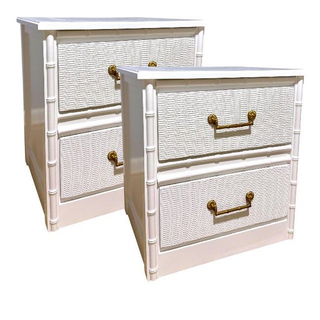 A beautifully refinished pair of Palm Beach–style nightstands featuring classic faux bamboo detailing and woven-texture...