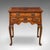 This is a vintage Georgian revival lowboy. An English, burr walnut four drawer side or hallway table, dating to the late...