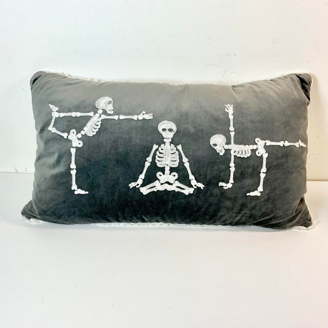 This Halloween Lumbar Velvet Lumbar Decorative Pillow features three skeletons in three different Yoga poses. The back is...