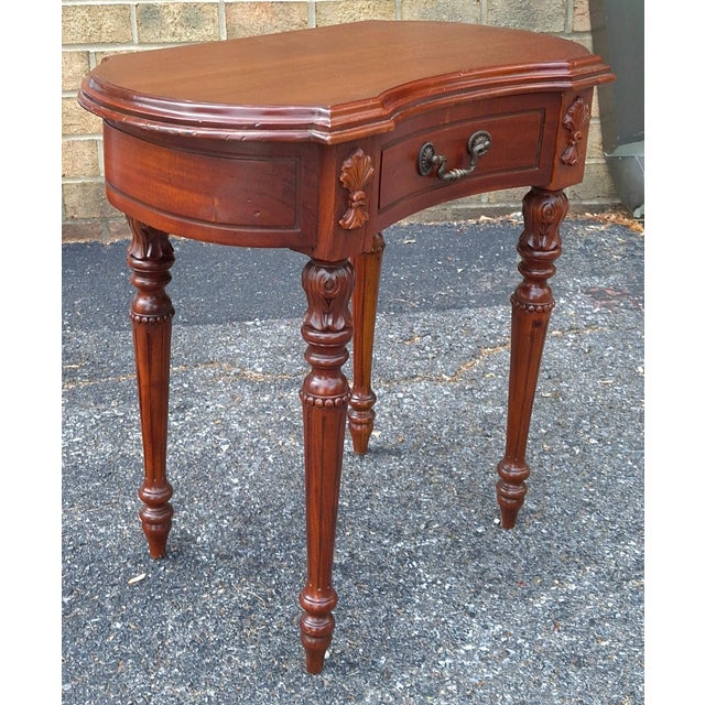 This exquisite vintage kidney-shaped accent table has been expertly refinished to showcase its unique, organic silhouette...