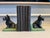A charming pair! Each 4 5/8 in. black cast-iron Scottie dog sits on a green L-shaped bracket. Perfect for dog lovers or a...