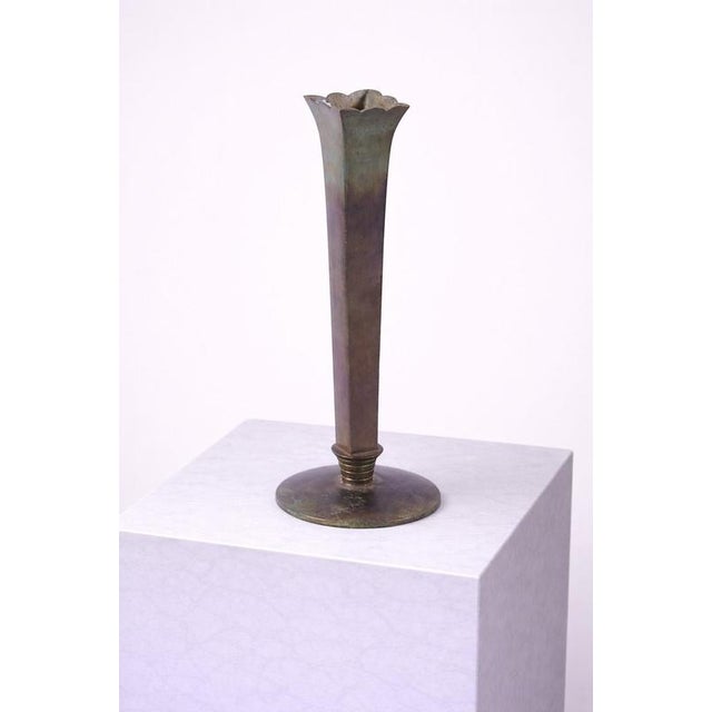 A refined and sculptural swedish art deco bronze vase produced by gab guldsmedsaktiebolaget (gab), circa 1930. This...