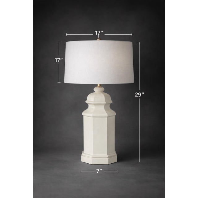 A sculptural 1970s octagonal ceramic table lamp in exceptional original condition. Finished in a warm cream glaze and...