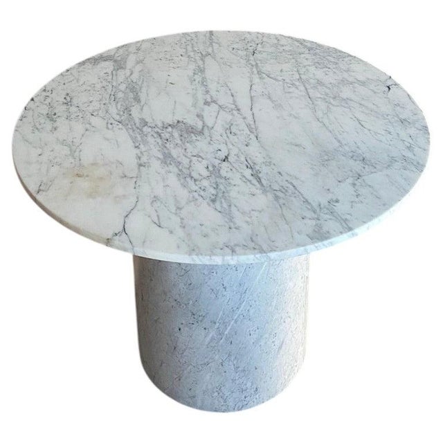 Two quarried solid (approximately 125lbs each) half cylinders abut to each other and form the base of this incredible...