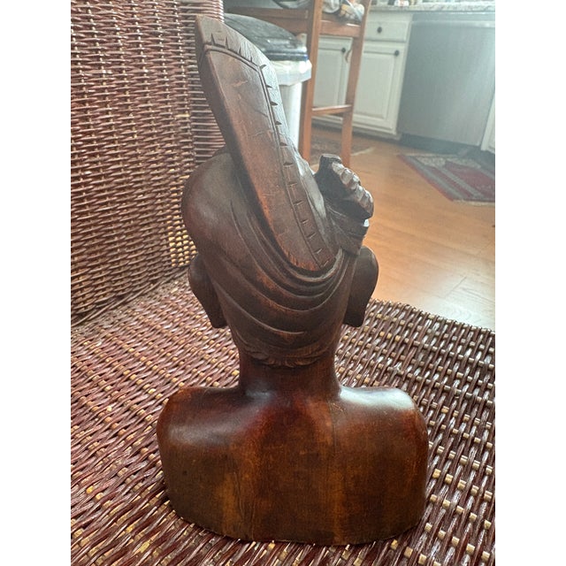 Mid Century Hand Carved Balinese Head of Boy. This carving is a very detailed carving showing the elaborate headdress and...