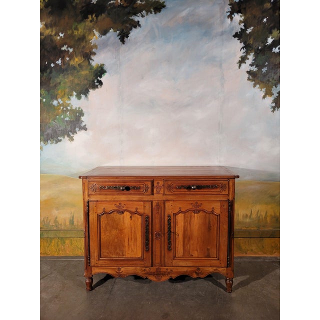 Elegant louis xv buffet from the end of the 18th century. this piece of furniture is made of fruit wood, cherry pear and...