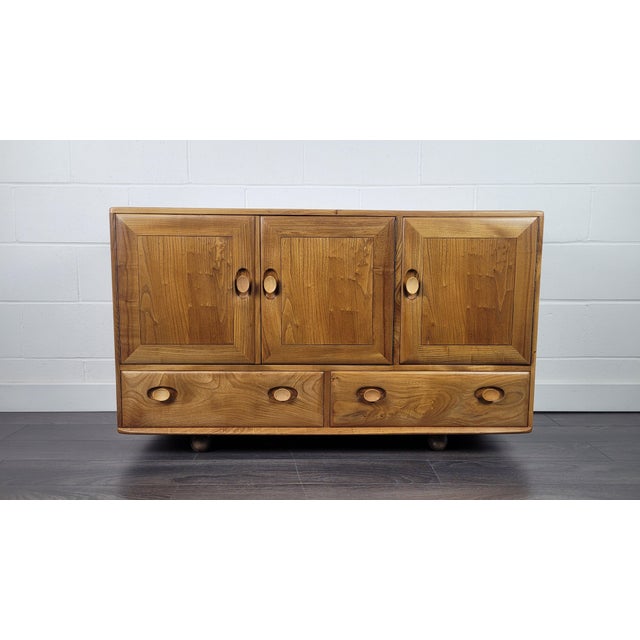 Sideboard by Lucian Ercolani for Ercol, 1960s, in Restored conditions. Designed 1960 to 1969 I have official proof of...