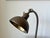Original early 20th century art deco period table/desk lamp in brass from France. A very elegant, well proportioned...