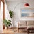The Half Dome Arc Lamp is a Peter Morelli-designed modern arc lamp with a satin nickel finish and a distinctive crimson...