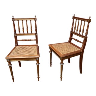 Pair of French Early 20th Century Louis XVI Style Caned Side Chairs With Brass Detail For Sale