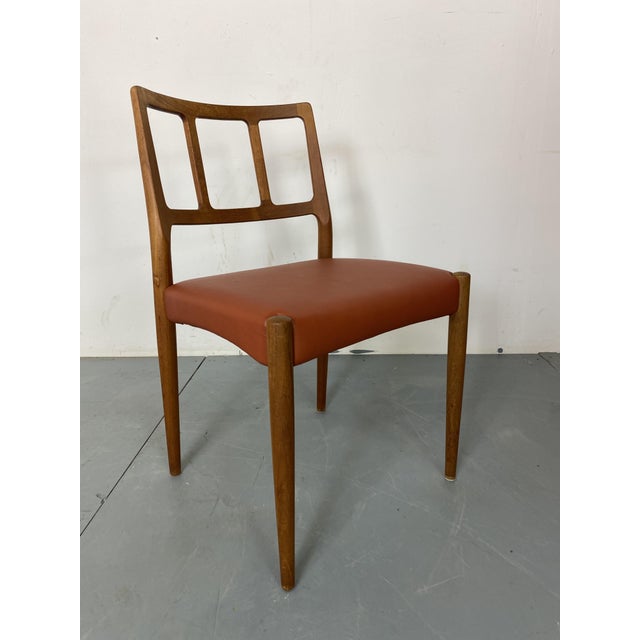 Iconic Mid-Century Danish Design Udlum Johannes Andersen teak and leather dining chairs, 1950s Nice organic teak frame...