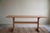 An elegant and classic rectangular dining table in a solid oak frame & teak veneered top. Designed by the danish couple...