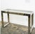 Modern chrome metal console table, featuring a series of evenly spaced vertical metal bars. CIRCA: 20th Century ORIGIN: USA