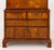 George II Walnut and Feather-Banded Chest on Chest, the top have with two short drawers above three graduated frieze...