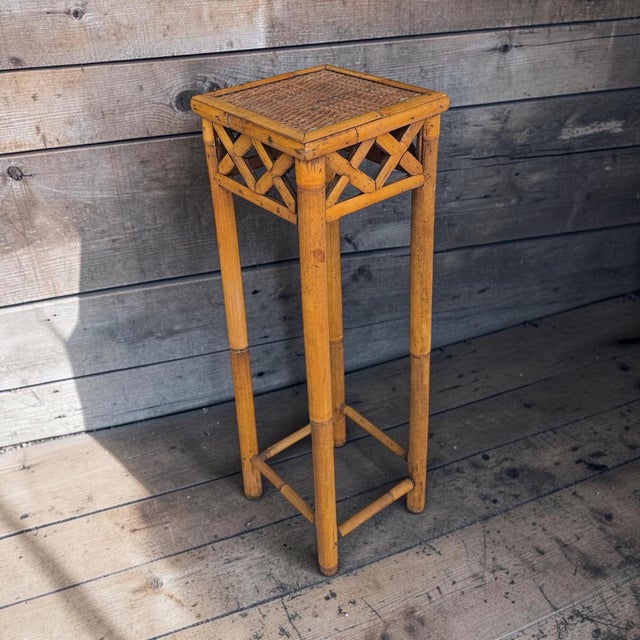 Vintage bamboo and woven rattan plant stand, drink, side table. Features an X pattern on all sides. Measures 9.5” square x...