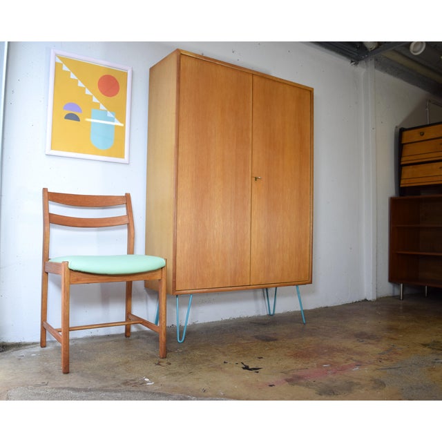 This is an elegant, multi-purpose cabinet from the 1960s by WK Möbel. The cabinet features a high-quality oak veneer....