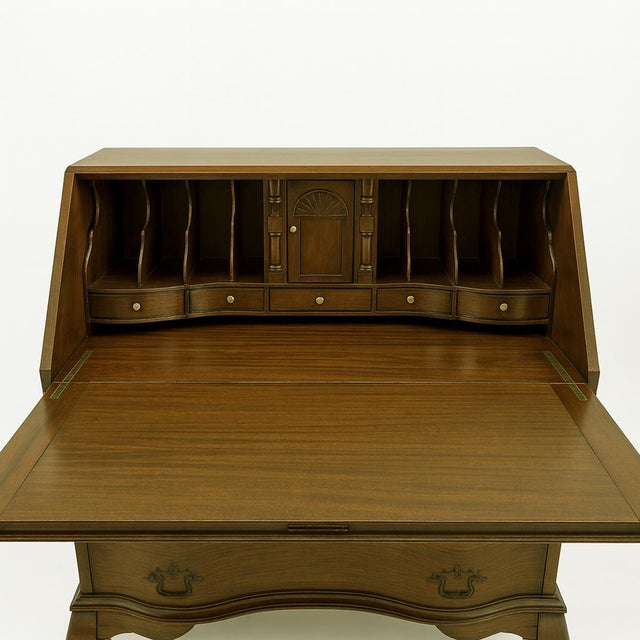 This antique Mahogany Secretary Desk showcases timeless craftsmanship and refined elegance. Finished in a classic rich...