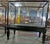 Antique late 19th century English display cabinet on stand. Glass doors open on sides. For showcasing artifacts,...