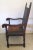 Bobbin Turned Walnut Armchair with Leather Upholstery, Ship Embossed Back and Nailhead Trim circa 1800 The leather is...