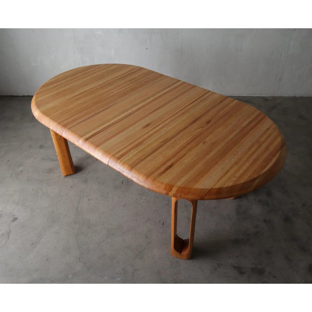 This beautiful, 1980's, oak oval extension dining table is a handmade masterpiece. I love the carved out detail in the...