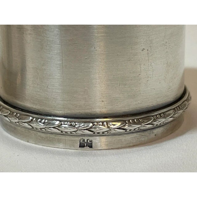 Pair Antique French Silverplate Napkin Rings With Raised Foliate Bands. Each has stamped cartouche with hallmark of...