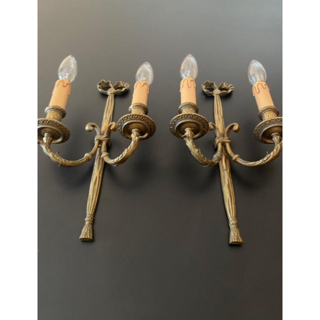 A magnificent pair of antique wall lights. France, late 19th century. The sconces are made of bronze—exquisitely hand-...