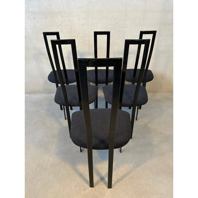 6 designer dining room chairs from CATTELAN ITALY. Black fabric seat in very nice condition. Black metal frame in good...