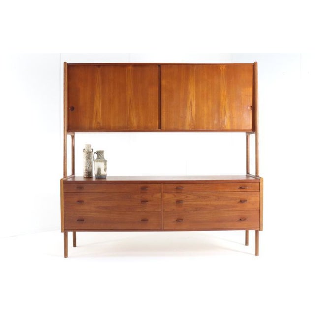 Designer: hans wegner spectacular and rare designer furniture this piece of furniture, designed by the renowned danish...