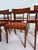 Add timeless elegance to your dining room with this vintage set of solid wood chairs, including one arm chair. Features...