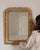 Cerused oak wall mirror in Weathered Whitewash. Its weathered whitewash finish sets off simple molded frame, softly worn...