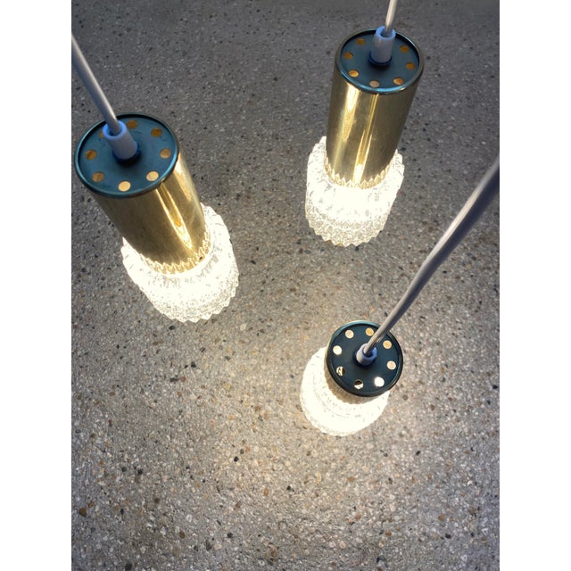 A hanging lamp is for sale *Cascade lamp *3-armed *probably from Sische or Leclair & Schäfer *from Germany in the 1970s...