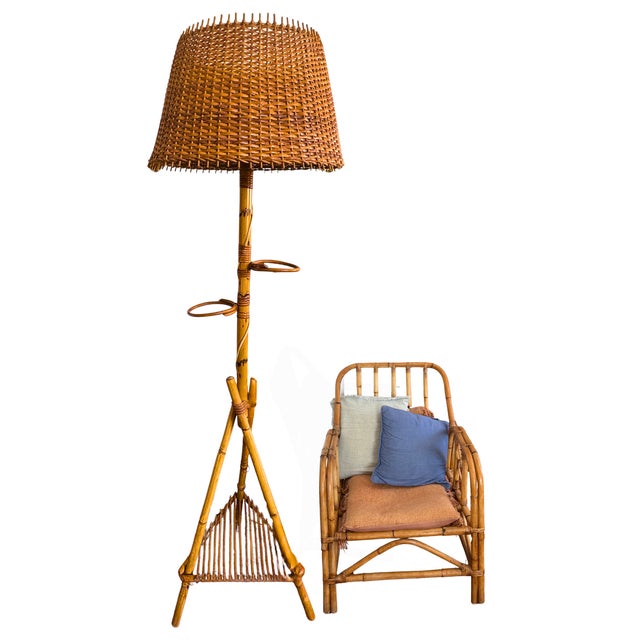 A spectacular vintage French Riviera floor lamp crafted from bamboo and rattan, dating from the 1960s–1970s. Its...