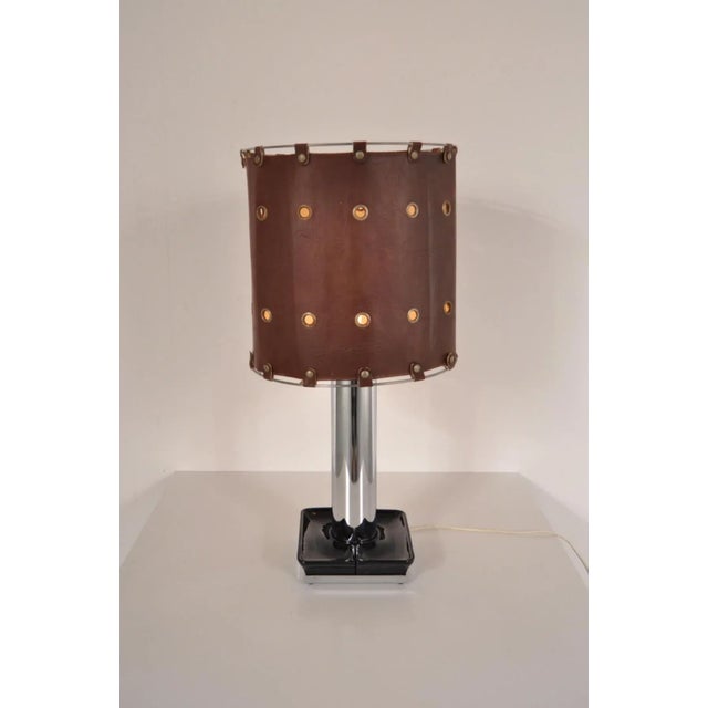 This pair of Italian table lamps was made in the 1960s. The bottom is a black ceramics ashtray that can be divided into...