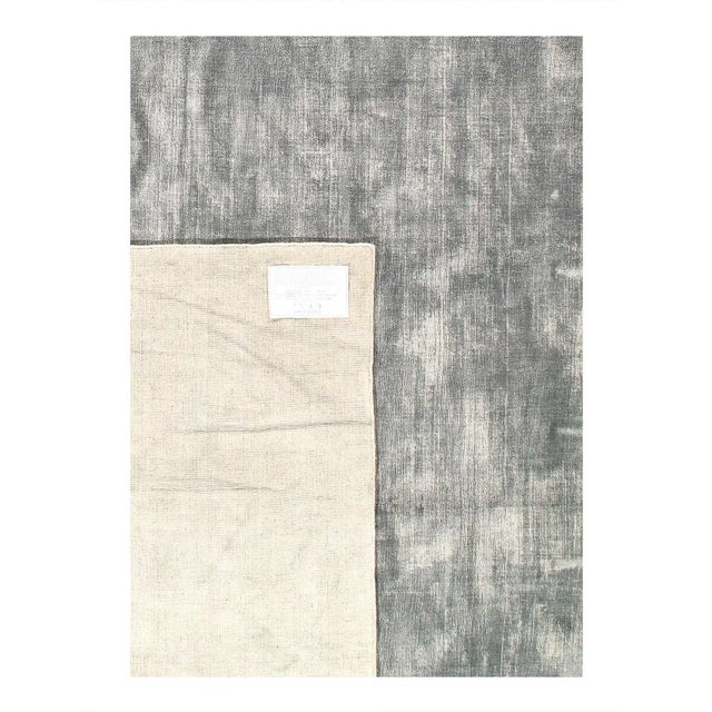 Loomed by hand in India, our Shine Rug blends durable lustrous viscose for a striated look that's both modern and...