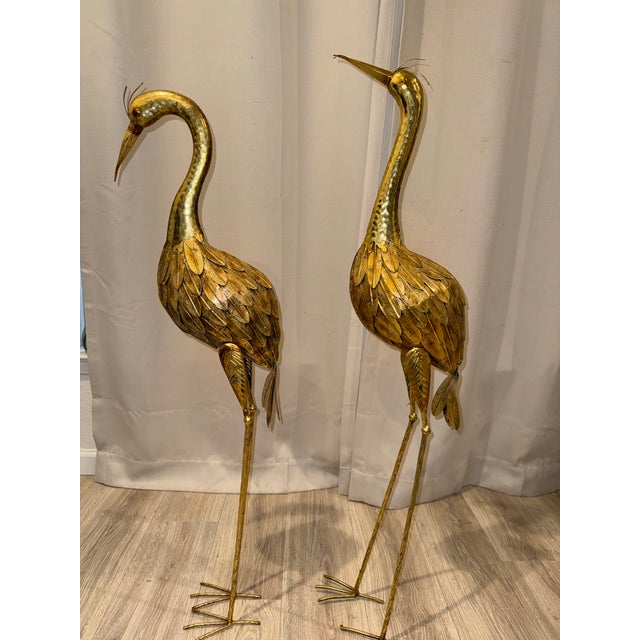 Add a commanding focal point to your interior with this striking pair of oversized crane sculptures. Standing at an...