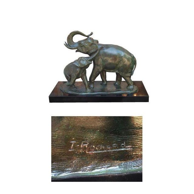 bronze figure Elephant with cub Signed: “Irenée Rochard” 1906-1984 France Bronze mounted on black Belgian marble base....