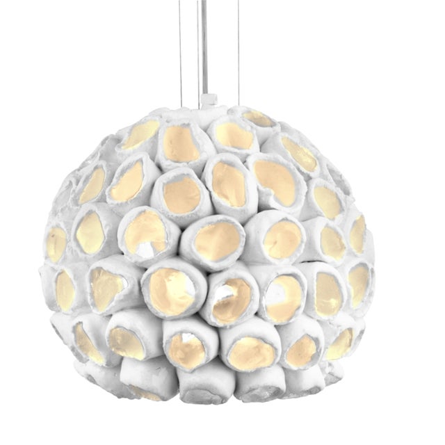 Designed by Lorenzo Zanovello for Oggetti, the Reef Round Suspension Light captures the intricate, organic forms of...