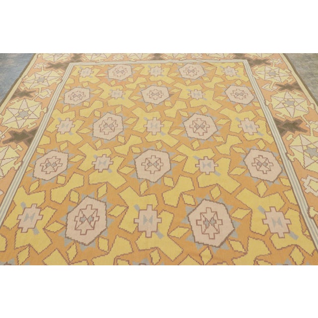 Handwoven in wool circa 1950-1960, this 8x10 vintage Kilim rug is among the most unique inspirations of Bessarabian...